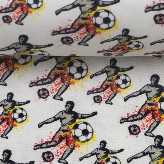 Baumwolle Webware Steinbeck Fußballer rot - gelb mit Fußball auf weiß